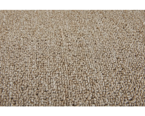 Närbild av en beige matta