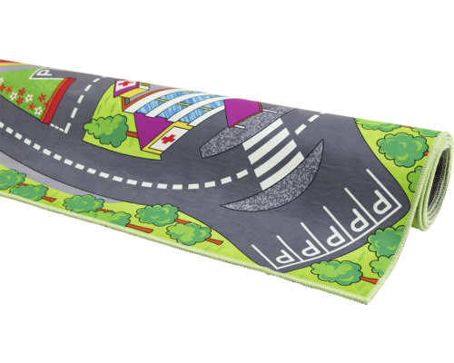 Lekmatta med stadsmotiv upprullad