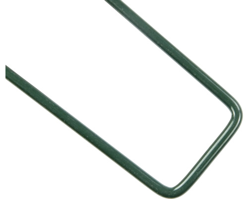 Detaljbild av ett hörn på ett grönt växtstöd