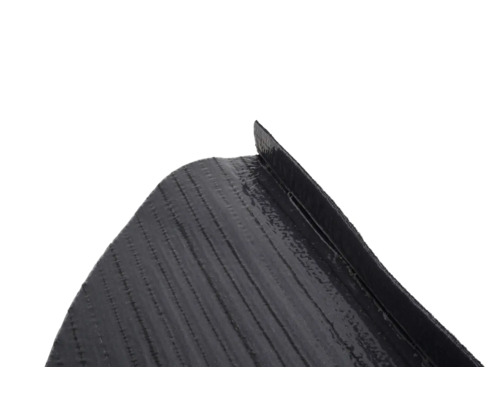 Detaljvy av en gräskant av plast