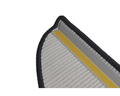 Detaljvy av en dörrmatta med tejp och kant