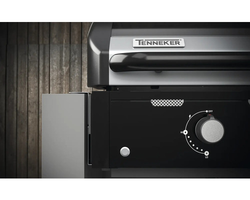 Detaljvy av Tenneker gasolgrill med kontrollpanel och temperaturregulator