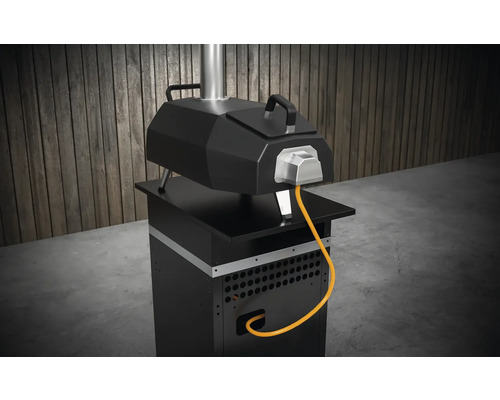 Svart pizzaugn med gasanslutning och underrede