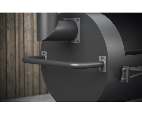 Detaljvy av en grill med handtag