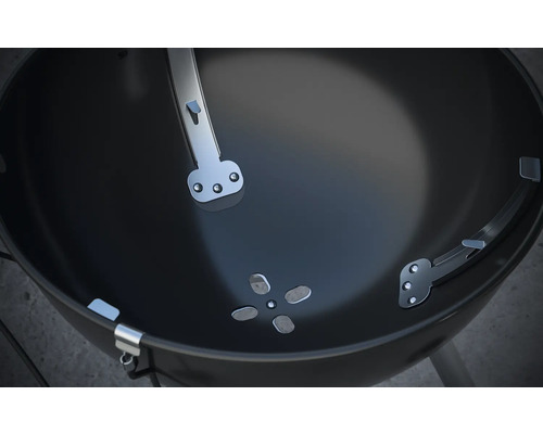 Insida av en klotgrill med ventilationsregulator