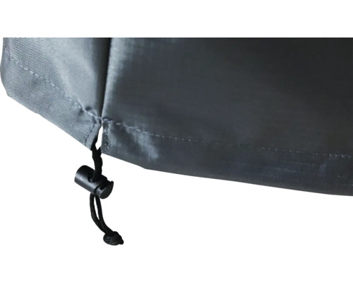 Detalj av ett skyddshölje med dragsko för fastsättning