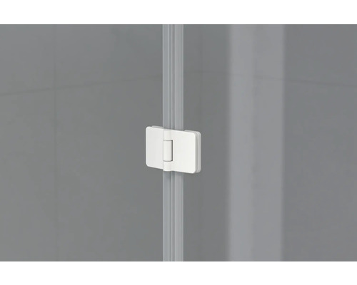 Detaljvy av ett duschkabin gångjärn.