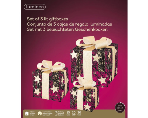 Set med tre upplysta presentaskar med stjärnor och rosetter, batteridriven