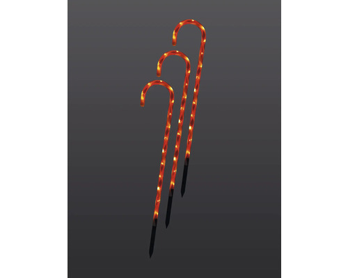 Tre dekorativa polkagrisstänger med belysning