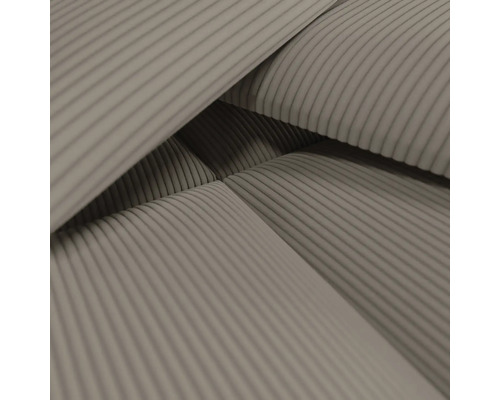 Närbild av ett möbeltyg med manchesterstruktur