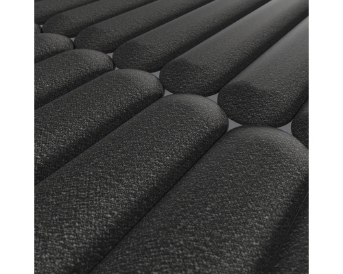 Närbild av en svart dörrmatta med ribbad profil