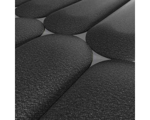 Närbild av texturerade, svarta gatstenar