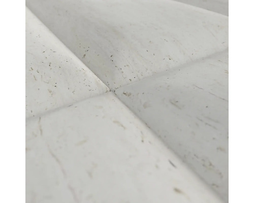 Närbild av vita 3D väggpaneler