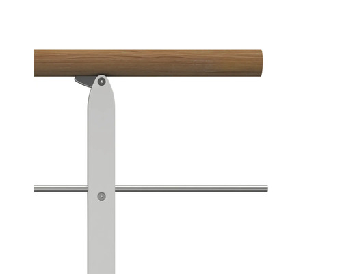 Detaljvy av balettstång med trästång, metallstativ och tvärstång