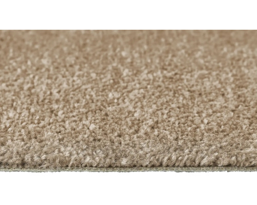 Närbild av en beige matta