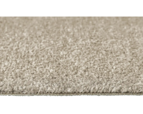 Närbild av en beige matta