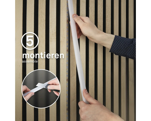 Fästning av en LED-remsa på en träribbvägg, illustrerad som steg fem av monteringen