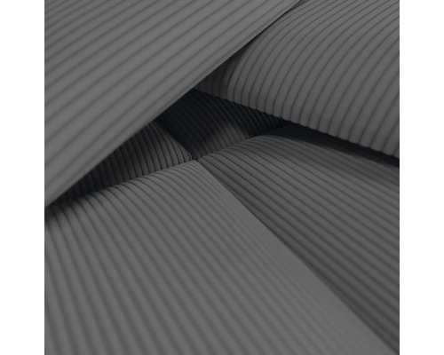 Närbild av möbelklädsel med manchestermönster