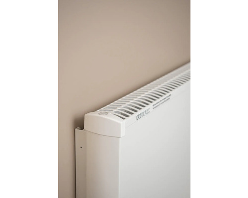 Vit elvärme monterad på väggen