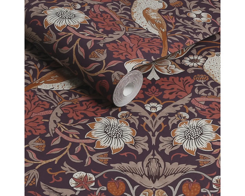 En rulle tapet med fågel- och blommönster.