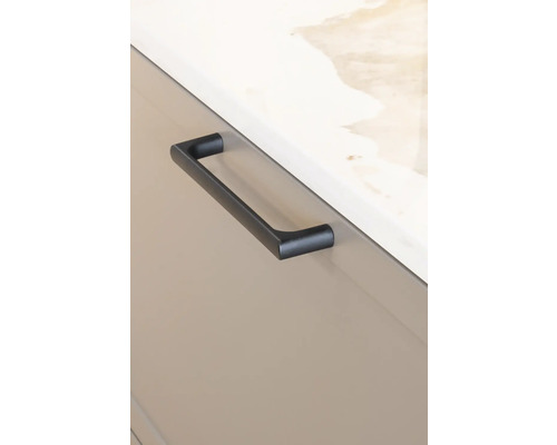 Handtag på en låda eller dörr