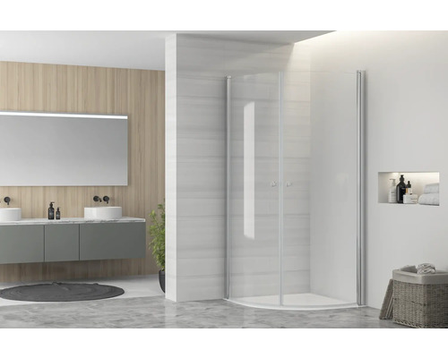 Modernt badrum med dusch, tvättställ och spegel