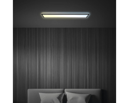 Taklampa ovanför sängen i sovrummet