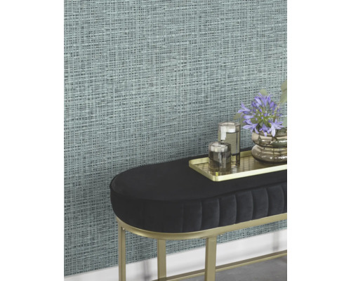 Närbild av en strukturtapet med ett abstrakt vävt mönster