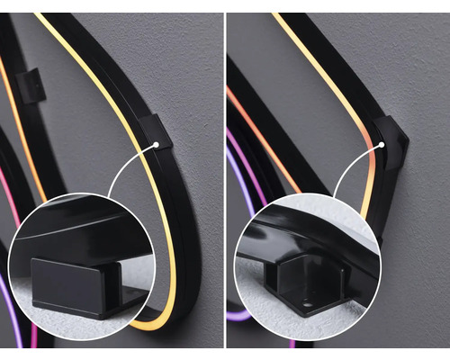 Detaljbild av en LED-vägglampa med svart fäste för väggmontering.