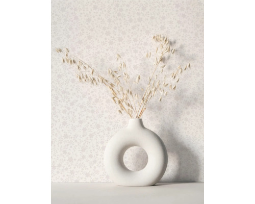 Dekorativa torkade blommor i en rund vas