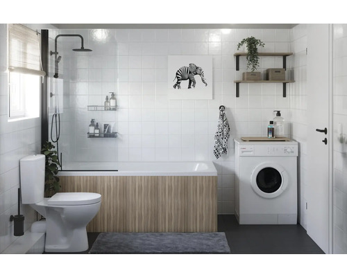 Badrum med badkar, duschvägg, tvättmaskin, toalett och handfat