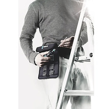 Man med Wera verktygsset på bältet och stege i bakgrunden.