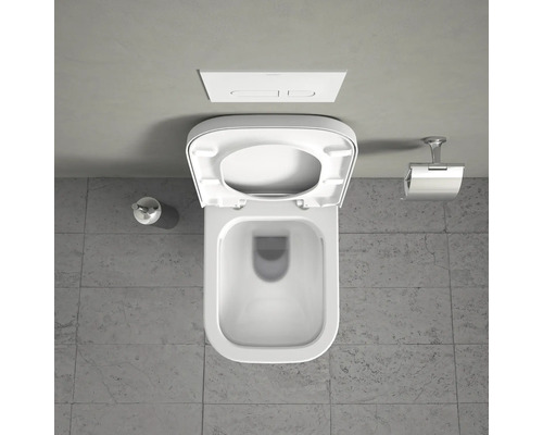 Vy från ovan av en vit toalett med öppet lock och cistern