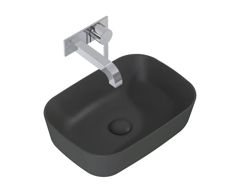 Tvättställ av sanitetskeramik med blandare