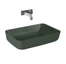 Tvättställ och väggmonterad blandare i badrummet