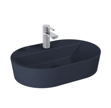 Oval tvättställ i keramik med blandare