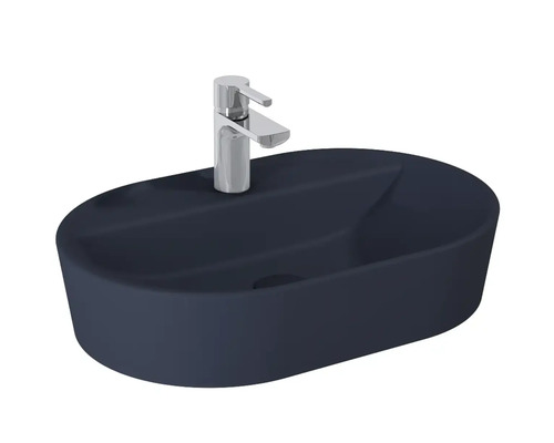 Oval tvättställ i keramik med blandare