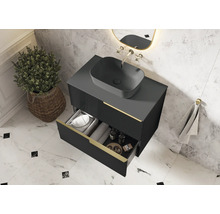 Modernt badrum med handfat, underskåp med låda och dekoration