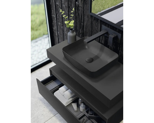 Tvättställ med lådor, tvättställsskål och blandare i badrummet