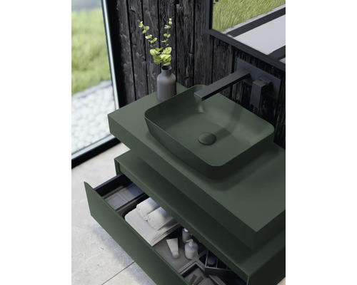 Modernt badrum med tvättställsskåp, tvättställsskål och öppna lådor