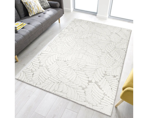 Matta med bladmönster i ett ljust vardagsrum