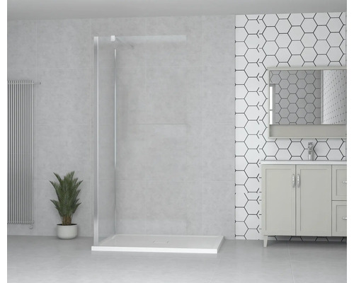 Ljust badrum med duschkabin, tvättställsskåp och dekorativ väggbeklädnad.