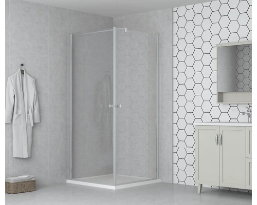 Hörndusch med klart glas och duschkabin i ett ljust badrum