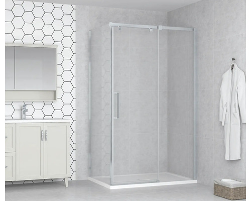 Duschkabin med skjutdörr i ett ljust badrum.