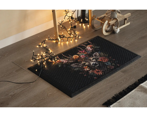 Dörrmatta med hjortmotiv och blomdekoration