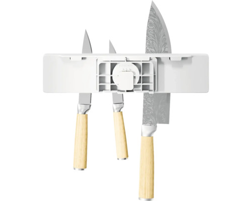 Magnetisk knivlist med olika knivar.