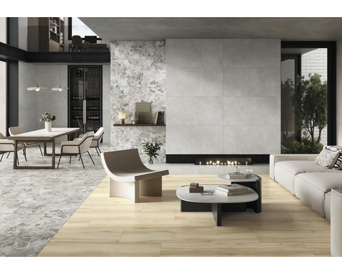 Vardagsrum i modern stil med klinkergolv, matbord och öppen spis