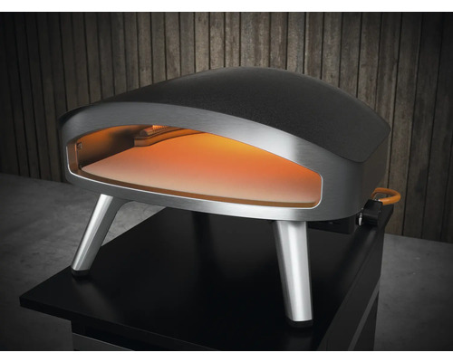 Pizza ugn med gasanslutning på ett bord