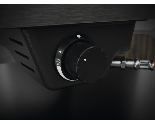 Närbild av en gasgrillsregulator med markeringar för maximal effekt