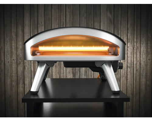 Elektrisk pizzaugn på ett bord